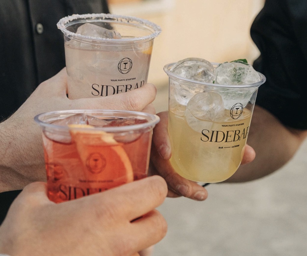Guests enjoying cocktails at a catered event